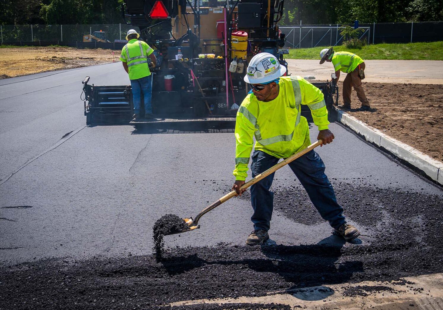 Professional paving crew at work
